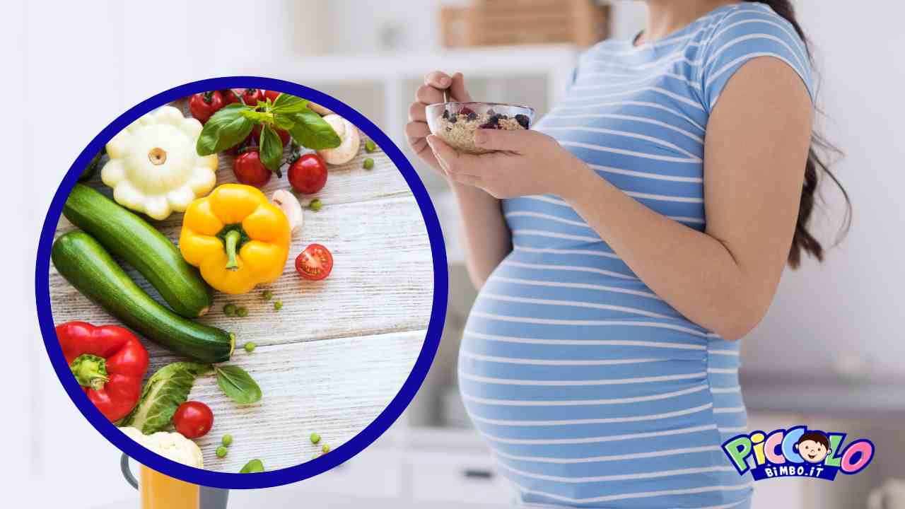 donna incinta che mangia verdura